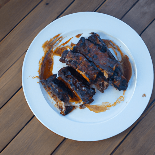 23144148-ribs-de-boeuf-grillees-a-la-sauce-barbecue-epicee